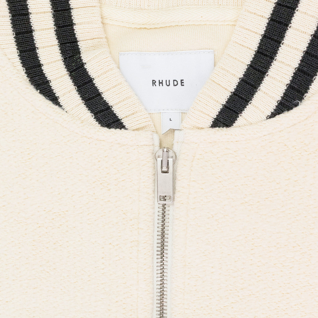 CREAM QUARTER ZIP VARSITY SWEATER