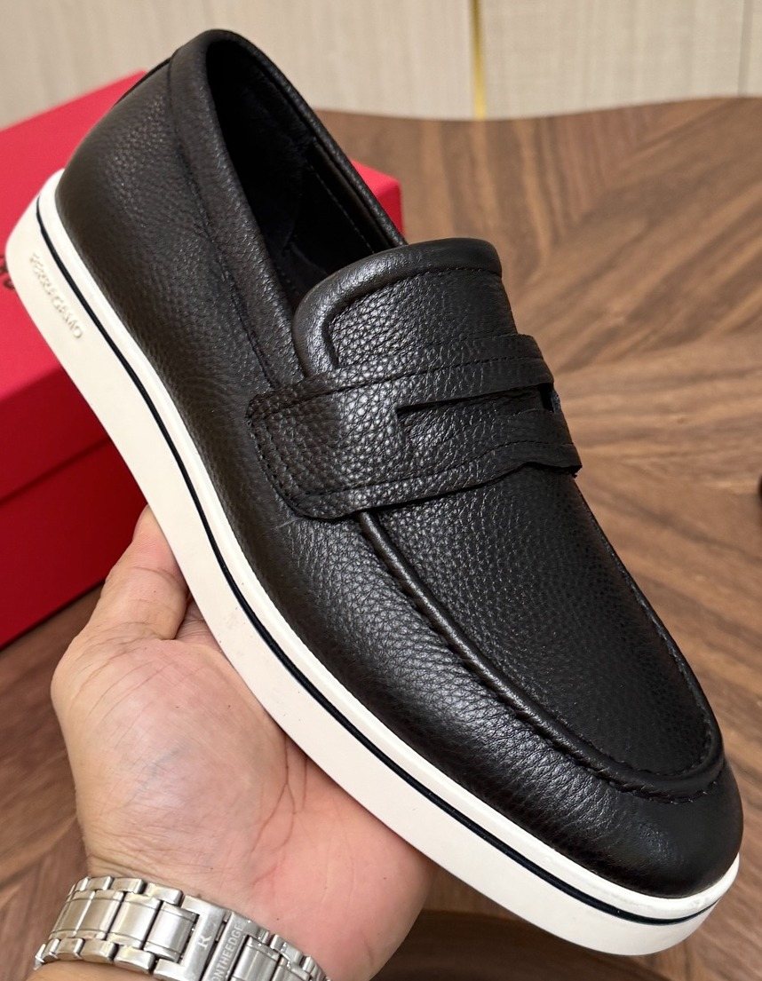 Salvatore Ferragamo Black Loafers with White Soles