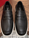 Salvatore Ferragamo Black Loafers with White Soles