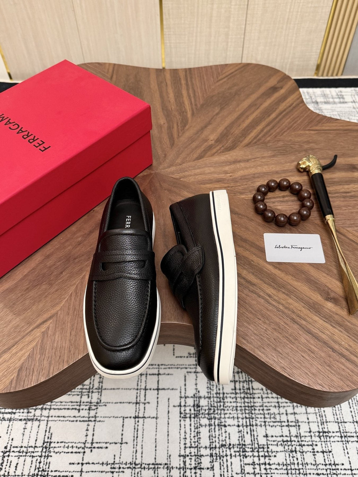 Salvatore Ferragamo Black Loafers with White Soles